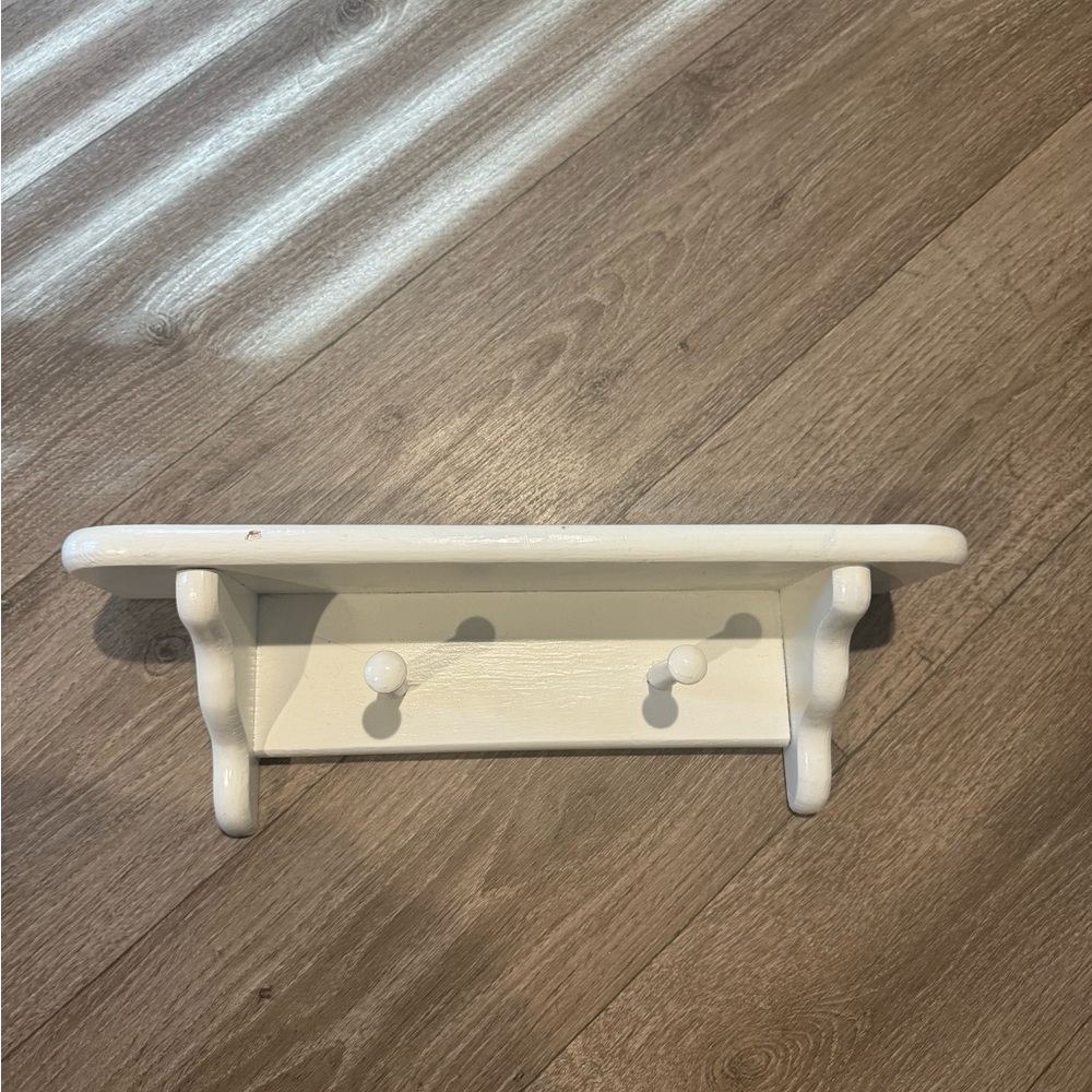 White Wooden Wall Shelf with Pegs